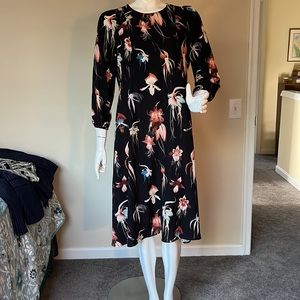 H&M dress. Black with floral print. Size 14